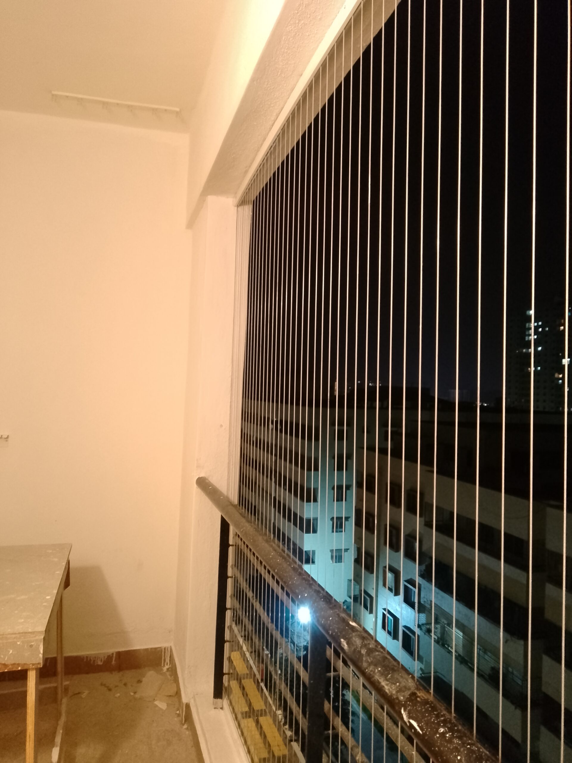 Invisible grill installation high rise flat Chennai